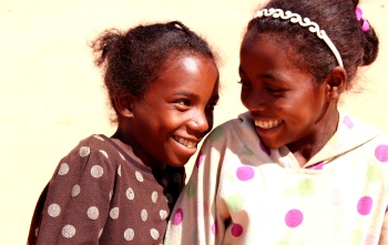 Two girls smiling in Madagascar