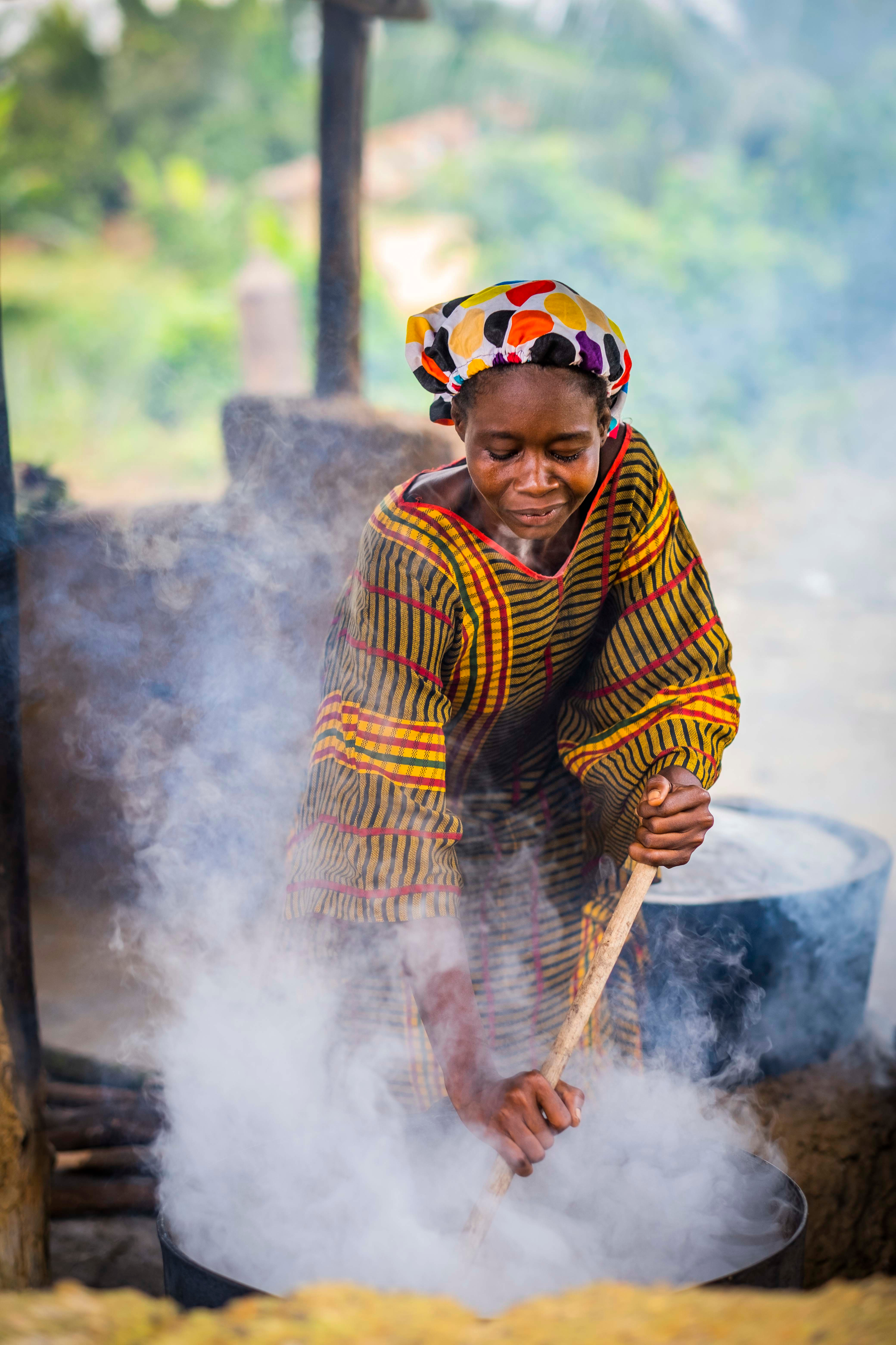 A volunteer prepares food in Liberia
