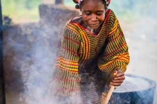A volunteer prepares food in Liberia