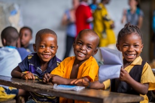 Schoolchildren in Liberia smiling