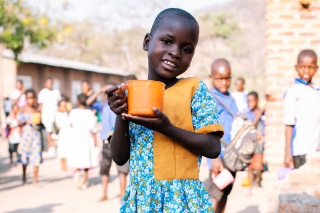 Child eating Mary's Meals