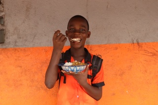 Child eating Mary's Meals