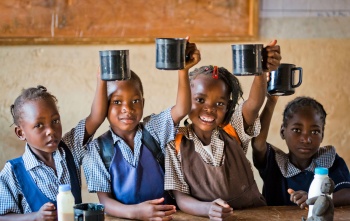 Children enjoying Marys Meals in class