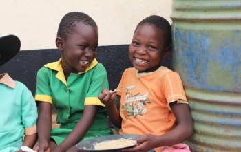 Children in Zimbabwe enjoying Marys Meals
