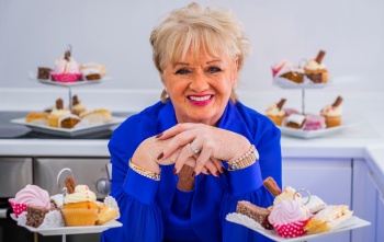Bernadette Barr with cakes
