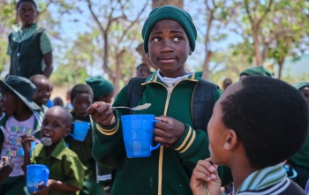 Image of a child with their school meal