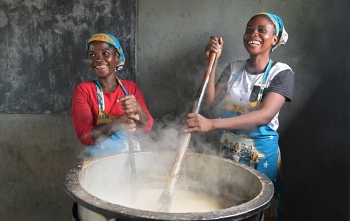 Image of cooks preparing school meals