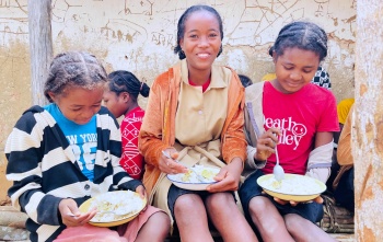Valicia and friends with their school meal in Madagascar