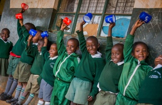 Children in Kenya waiting for their school meal