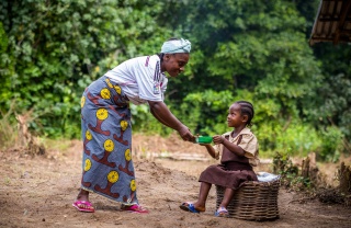 Cook serving Marys Meals in Liberia