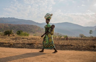 Women in Malawi carrying Marys Meals