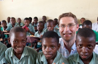 Magnus with children in Haiti