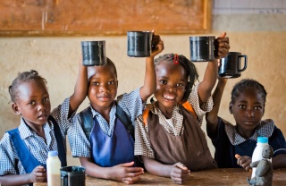 Children enjoying Marys Meals in class