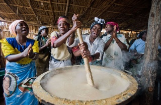 Volunteers cooking Marys Meals for their children