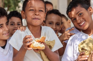 Children enjoying Mary's Meals in Yemen