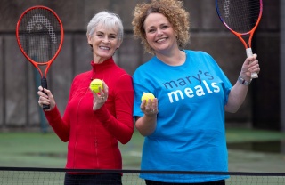 Judy Murray and Head of Supporter Care for Mary's Meals Suzy Harley, with tennis rackets and balls