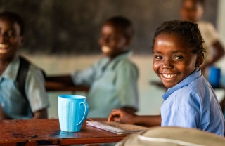 Child in the classroom in Malawi