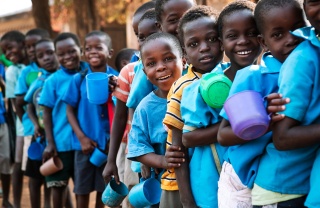 Children waiting for Marys Meals in Malawi