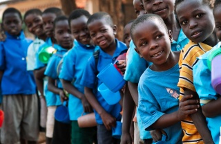 Image of children waiting for their school meals
