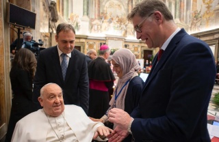Magnus MacFarlane-Barrow shaking hands with Pope Francis