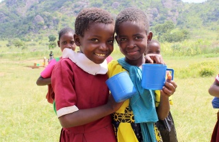 Image of two children walking to school