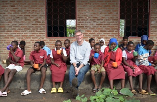 Magnus with children in Malawi