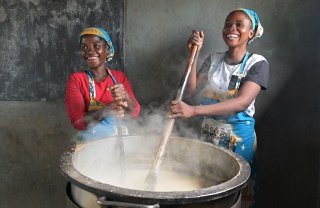 Image of cooks preparing school meals
