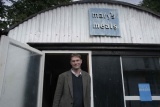 Mary's Meals founder, Magnus MacFarlane-Barrow standing outside The Shed, the global HQ of Mary's Meals.