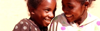 Two girls smiling in Madagascar