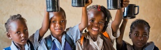 Children enjoying Marys Meals in class