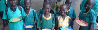 Children holding their meals in South Sudan