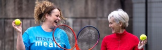 Judy Murray and Head of Supporter Care for Mary's Meals Suzy Harley, with tennis rackets and balls
