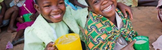 Children in Malawi enjoying Mary's Meals
