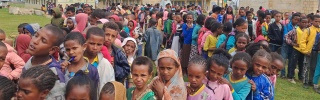 Children queueing for Mary's Meals food in Tigray