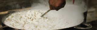 Image of pot of rice being stirred