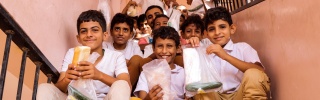Children enjoying lunch, Yemen