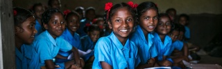 Image of child in classroom in India learning