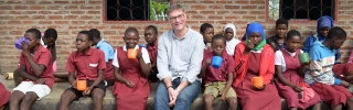 Magnus with children in Malawi