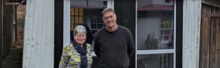 Julie Ramsay, Inner Wheel, with Mary's Meals Founder, Magnus MacFarlane-Barrow at the shed in Dalmally.