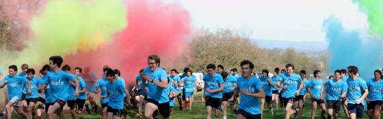 Fundraisers run among bright colours
