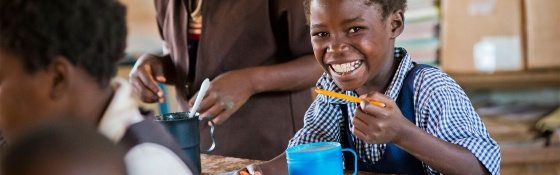 Children in Zambia eating Marys Meals