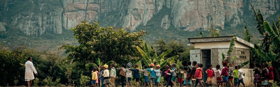 Image of children walking in line to class