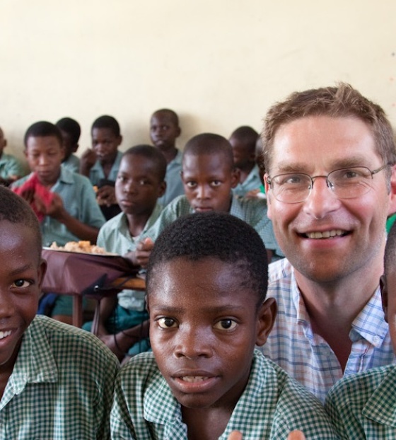 Magnus with children in Haiti