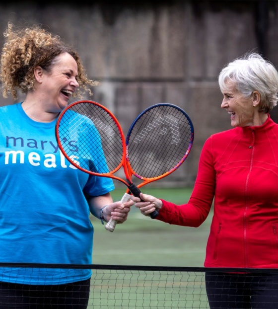 Judy Murray and Head of Supporter Care for Mary's Meals Suzy Harley, with tennis rackets and balls