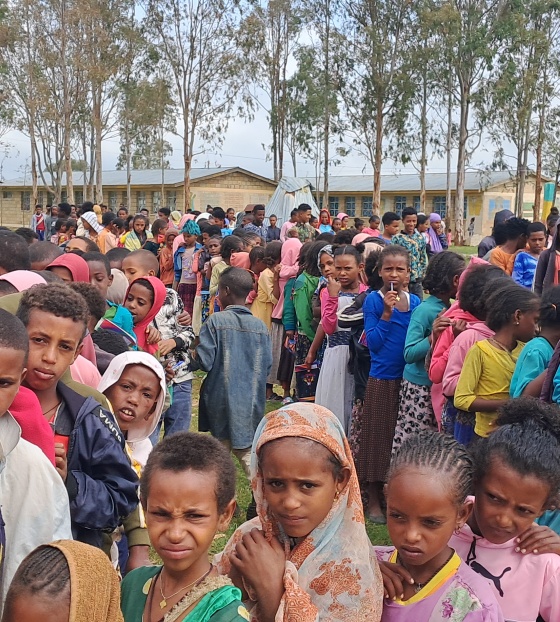 Children queueing for Mary's Meals food in Tigray