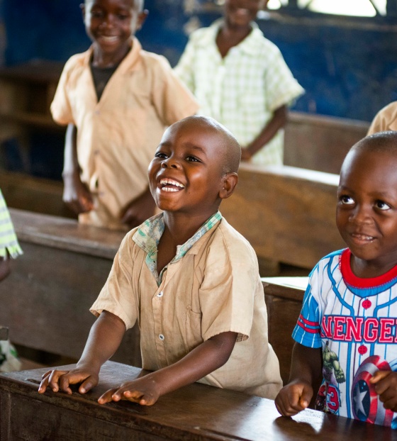 Children laughing in a classroom together