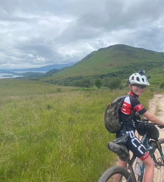 A young boy, Cameron, on his bike on a cycle path on the West Highland Way
