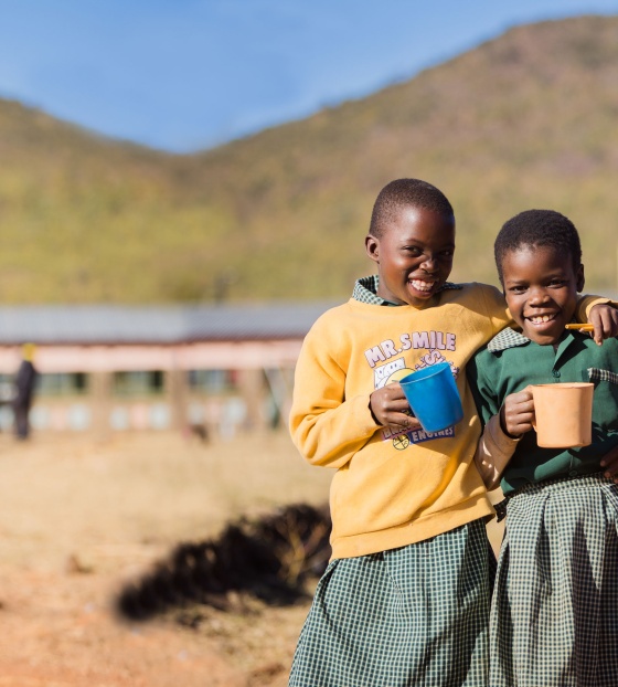 Image of children holding their Marys Meals