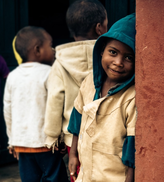 Image of a child in Madagascar waiting for their Mary's Meals
