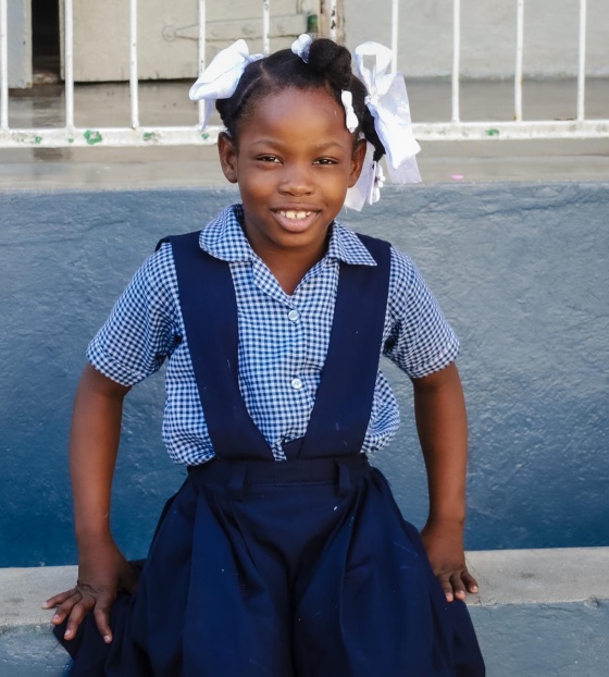 Image of a happy child in school